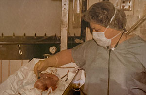 Dr. Shirley A. Wilkerson with a newborn Dr. Shirley A. Wilkerson with a newborn